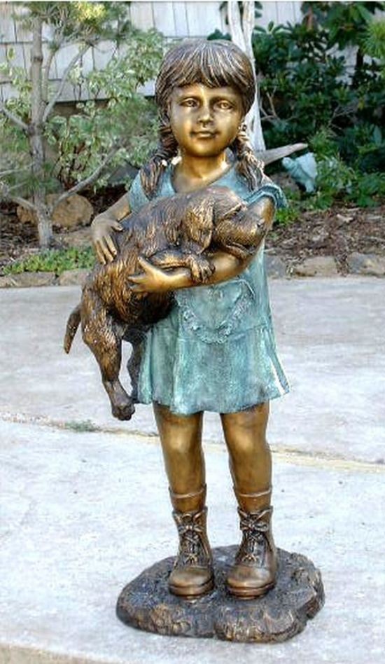 "Can I keep him?" Girl holding dog