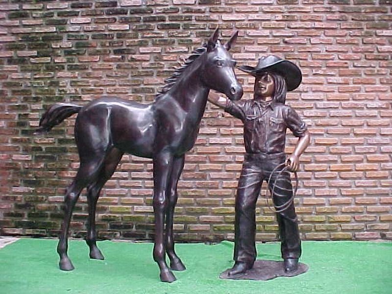 Cowgirl with foal