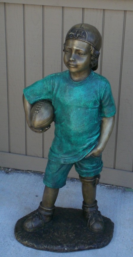 Boy holding football