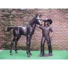 Cowgirl with foal