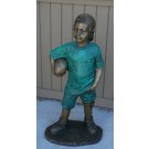 Boy holding football