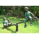 Boy & girl on seesaw